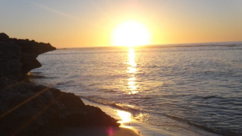 https://www.writteninwaikiki.com/my-time-as-a-checkout-chick/ beach sunset western australia