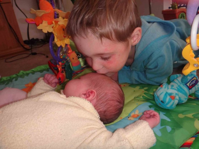 https://www.writteninwaikiki.com/three-becomes-four-dealing-new-sibling/ kids siblings baby toddler