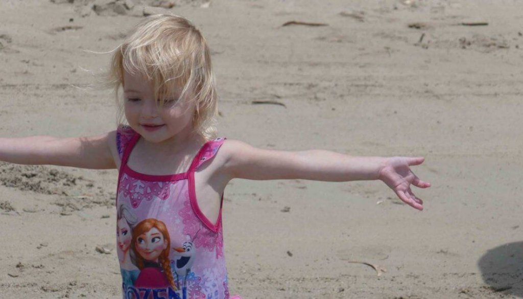 girl happy at beach