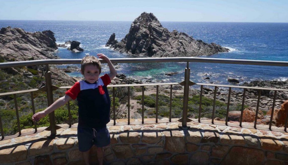 child standing at Sugarloaf Rock Yallingup Western Australia