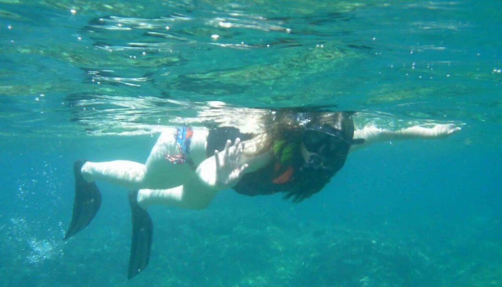 reverse bucket list woman snorkelling
