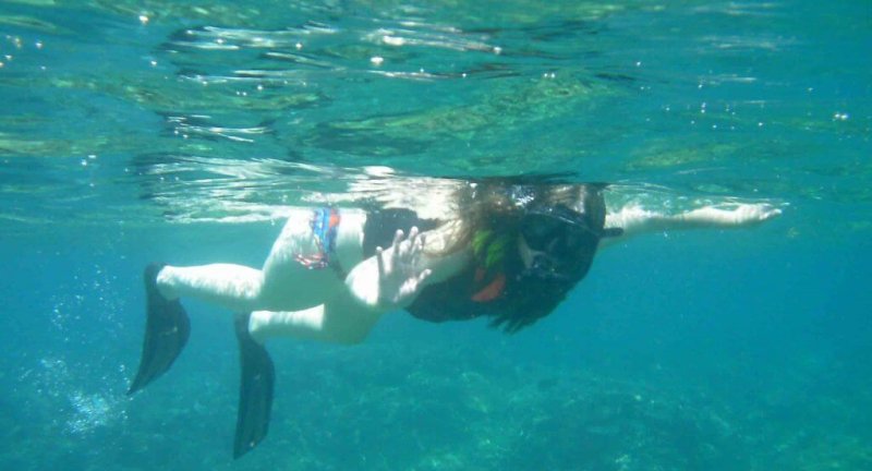 reverse bucket list woman snorkelling