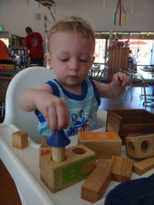 boy toddler playing with blocks
